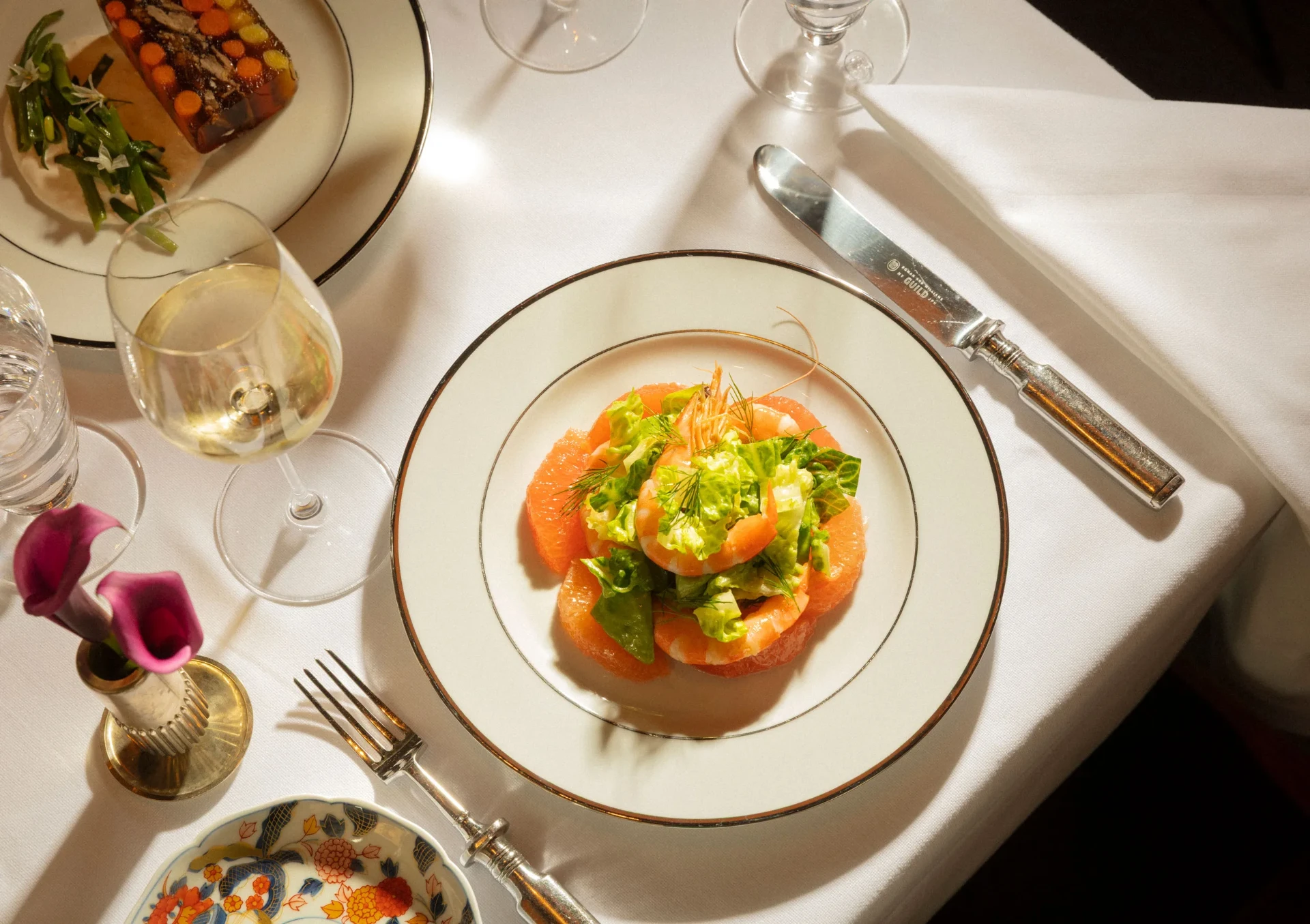Elegant plated coastal cuisine at Musituni restaurant